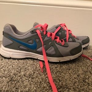 Pink and Grey Nike Revolution Sneakers